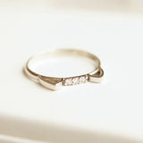 tiny diamonds in white gold dainty ring