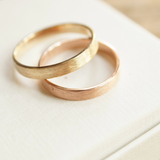 brushed yellow gold and rose gold wedding rings