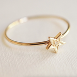 tiny gold ring with star
