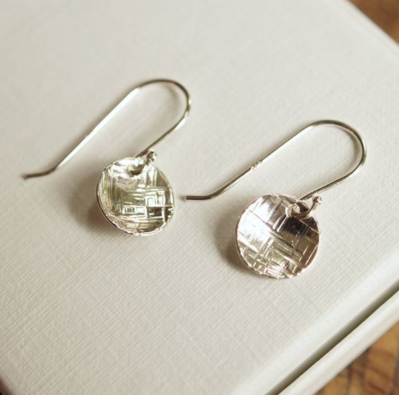 hammered silver earrings on French hooks
