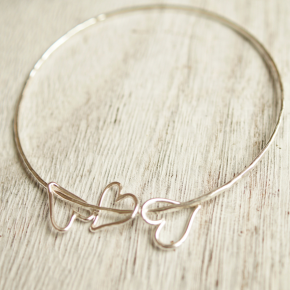 sterling silver stacking bangle with heart charms