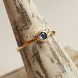 Teal montana sapphire ring with tiny diamond