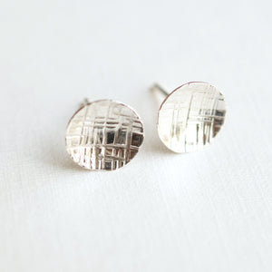 small and simple round silver disc earrings hammered