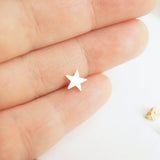 Tiny solid gold star