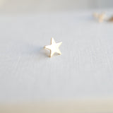 Gold star earring